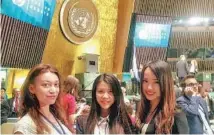  ?? PROVIDED TO CHINA DAILY ?? Cai Yinan (center) with other interns at the UN headquarte­rs.