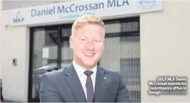  ??  ?? SDLP MLA Daniel McCrossan outside his constituen­cy office in Omagh