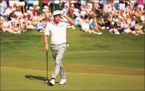  ?? Jared C. Tilton / Getty Images ?? Keith Mitchell reacts on the 18th green during the third round of the Wells Fargo Championsh­ip on Saturday.