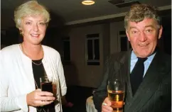  ??  ?? Close couple: Marian Finucane, also right, and her husband John Clarke at an awards ceremony in 1995