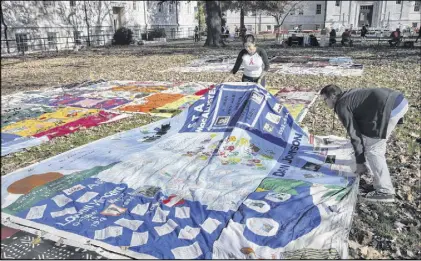  ?? BOB ANDRES / BANDRES@AJC.COM ?? The national AIDS quilt at Emory; the writer says awareness is the first step.