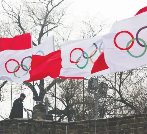  ?? NG HAN GUAN / THE ASSOCIATED PRESS FILES ?? Not awarding the Olympic Games to murderous one-party states like China is “a guaranteed way to prevent them
being used to glorify systems that dehumanize their own people,” Kelly Mcparland writes.