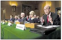  ?? Bloomberg News/ZACH GIBSON ?? Scott Garrett (right), President Donald Trump’s nominee to lead the Export-Import Bank, speaks in front of the Senate Banking, Housing and Urban Affairs Committee during a confirmati­on hearing last month in Washington.