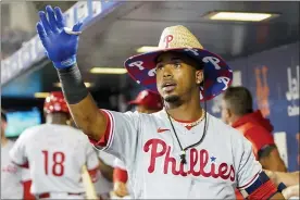  ?? MARY ALTAFFER — THE ASSOCIATED PRESS ?? Philadelph­ia Phillies’ Jean Segura after hitting a solo home run during the first inning of a baseball game against the New York Mets, Saturday, Sept. 18, 2021, in New York.