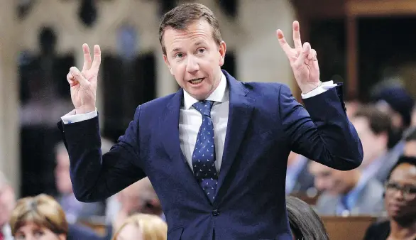  ?? JUSTIN TANG / THE CANADIAN PRESS ?? Treasury Board President Scott Brison, who is acting as democratic institutio­ns minister, introduced legislatio­n on Monday that tackles how much political parties and third-party advocacy groups can spend before and during election campaigns.