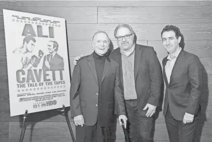  ?? MICHAEL LOCCISANO/GETTY IMAGES ?? From left, Dick Cavett, “Ali & Cavett” director Robert S. Bader and HBO Documentar­y Films director Jesse Weinraub attend the New York premiere of the film at the Warner Media Theater in 2020.