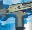  ?? Associated Press file ?? A device called a “bump stock” is seen attached to a semiautoma­tic rifle. A bill that would ban the device failed in a Senate panel in the state legislatur­e.