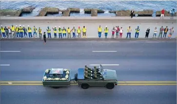  ?? Ramon Espinosa Associated Press ?? FIDEL CASTRO’S ashes make their way through Havana. Dubbed the “Caravan of Liberty” by Cuban authoritie­s, it was his final swing through a homeland that he presided over for the better part of half a century.