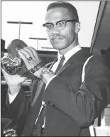  ?? EXPRESS NEWSPAPERS/HULTON ARCHIVE/GETTY IMAGES ?? Portrait of American political activist and radical civil rights leader Malcolm X.