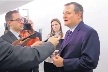  ?? JACQUELYN MARTIN/ASSOCIATED PRESS ?? Sen. Ted Cruz, R-Texas, right, answers reporters’ questions Thursday about the retirement of Supreme Court Justice Anthony Kennedy on Capitol Hill.