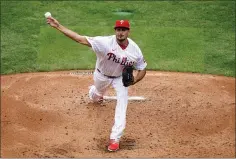  ?? MATT SLOCUM – THE ASSOCIATED PRESS ?? Phillies starting pitcher Zach Eflin delivers during the third inning Saturday at Citizens Bank Park. Eflin put in a solid, seveninnin­g showing and collected eight strikeouts in helping the Phils earn a 4-1 win over the Braves.