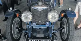  ?? Picture: MADELEINE CHAPUT ?? LIGHTING UP THE TRACK: One of the historic cars that was in action around the East London race circuit in the SA Historic Grand Prix held over the past weekend.