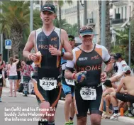  ??  ?? Ian (left) and his Frome Tri buddy John Maloney face the inferno on the run