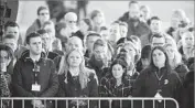  ?? Emmanuel Dunand AFP/Getty Images ?? BRUSSELS’ airport employees attend a memorial ceremony on the first anniversar­y of the 2016 attacks.