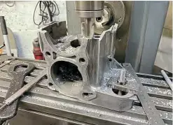  ??  ?? Machining the cut-off section to size.