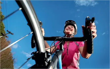  ?? PHOTO: ANDY JACKSON/FAIRFAX NZ ?? Brenda Crummey treasures her new racing bike, which was bought by the man who struck her with his car on May 16.