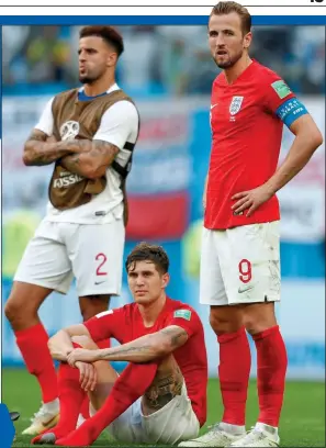  ??  ?? DEJECTED: Kyle Walker, John Stones and Harry Kane after yesterday’s play-off