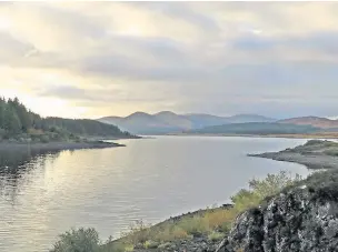  ??  ?? Peaceful Loch Doon with the Galloway Hills in the distance