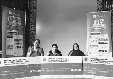  ??  ?? Wong (middle), Nur Farhidda (right) and Hii pose for a photo after winning the top three spots in Shopee’s first ever East Malaysia Entreprene­urs Challenge.