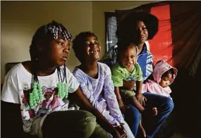  ?? Gary Coronado / TNS ?? Courtney Bailey, mother of five, with children, Noelle Morris, 7, left, Aullie Morris, 5, Brandon Morris, 11 months, and Wynter Morris, 24 months, at their apartment in Los Angeles on Oct. 16.