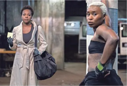  ?? PHOTOS BY MERRICK MORTON ?? Viola Davis, left, and Cynthia Erivo get ready for their heist in “Widows.”