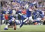  ?? THE ASSOCIATED PRESS ?? Buffalo Bills kicker Stephen Hauschka, right, with Corey Bojorquez holding, kicks a field goal against the Tennessee Titans during the second half of an NFL football game, Sunday, Oct. 7, 2018, in Orchard Park, N.Y.