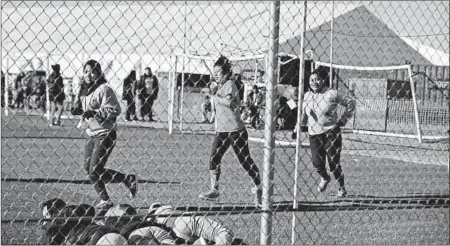  ?? IVAN PIERRE AGUIRRE/AP ?? Teens at the Tornillo detention camp on Sunday. It opened in June as a temporary shelter.