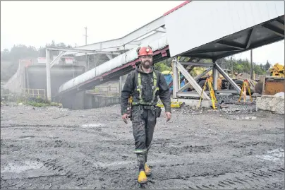  ?? SHARON MONTGOMERY-DUPE/CAPE BRETON POST ?? Lloyd MacCormack, 21, of Glace Bay, a mining engineer student at Dalhousie University and an employee of Kameron Collieries at the Donkin Mine, comes out of one of the mine entrances after conducting a safety inspection. There are currently 100...