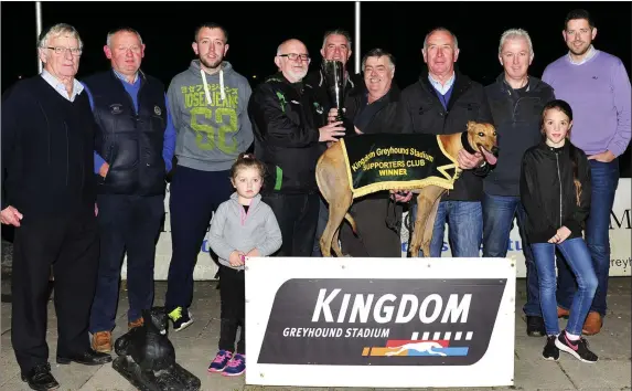  ??  ?? Chairman of the KGSSC Murt Murphy, fourth from left, presents the winner’s trophy to winning joint-owner Noel Power, from Ballyduff, after Jason’s Fifi won the K.G.S.S.C Members Stakes Final at the Kingdom Greyhound Stadium on Friday night. Included, from left, are Christy Donovan, Dan Lynch, K.G.S.S.C Secratary, James O’Rourke, Cassie O’Sullivan, Denis Moriarty, Patsy O’Rourke, winning trainer, Chris Houlihan, Jeff Griffin and Tia O’Sullivan. Photo by www.deniswalsh­photograph­y.com