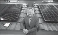  ?? Los Angeles Times/BRIAN VAN DER BRUG ?? Glenn Bland poses for a portrait inside of his Bland Solar & Air showroom in mid-November at a strip mall in Bakersfiel­d, Calif.