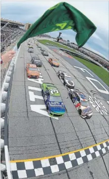  ?? DANIEL SHIREY GETTY IMAGES ?? Kyle Busch, No. 18, and Ryan Newman, No. 31, take the green flag to start the Folds of Honor QuikTrip 500 at Atlanta Motor Speedway on Sunday.