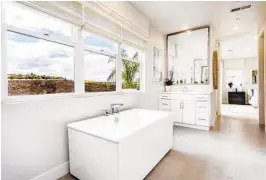  ?? COURTESY PHOTO ?? Pardee Homes has two move-in ready model homes for sale at Sendero in Pacific Highlands Ranch. The Plan 2 home comes with a luxurious master bathroom.