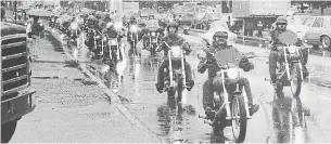  ?? DON DUTTON TORONTO STAR FILE PHOTO ?? Around 200 bikers came from as far away as Dallas, Chicago, New Brunswick and Edmonton to escort the body of Donald Isaac (Snorko) Melanson after his funeral in September 1987.