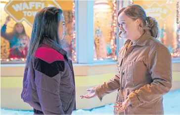  ??  ?? Anna Akana, left, and Liv Hewson in Let It Snow.