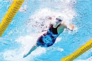  ?? — AFP photo ?? This picture taken with an underwater camera shows US Katie Ledecky competing in a heat of the women’s 200m freestyle during the swimming competitio­n at the 2017 FINA World Championsh­ips in Budapest, on July 25, 2017.