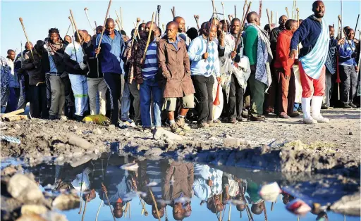  ?? PICTURE: ITUMELENG ENGLISH/AFRICAN NEWS AGENCY (ANA) ARCHIVE ?? PROGRESSIV­E: Hundreds of miners marched in Marikana in 2014. The constituti­on gives every worker the right to join a trade union, as well as the right to strike.