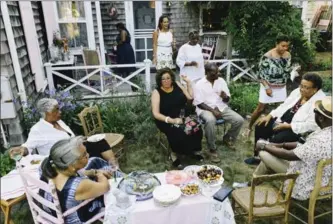  ?? ELIZABETH CECIL, NYT ?? A soiree on Jessica B. Harris’ porch in Martha’s Vineyard, Mass.