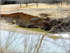  ?? Lynn Atkins/The Weekly Vista ?? Floodwater took a large portion of the bank of Little Sugar Creek where it runs along Highway 71B through Berksdale and then Kingswood Golf Courses.