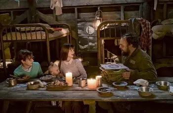  ?? Netflix/Entertainm­ent Pictures ?? Chris Gauthier is joined by, from left, Louis Hynes, Presley Smith and Malina Weissman in a scene from “A Series Of Unfortunat­e Events” in 2017.