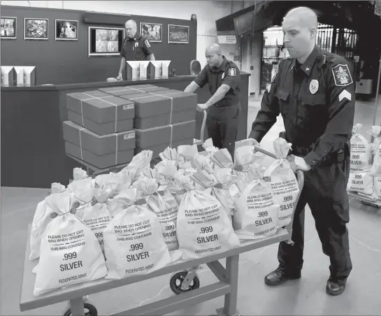  ??  ?? MASSACHUSE­TTS RESIDENTS CASH IN: Calls are pouring in from state residents who are trying to get their hands on the Jumbo Silver Ballistic Bags pictured above before the deadline ends. That’s because residents who find their zip code printed in today’s publicatio­n are cashing in on the lowest ever State Minimum price set for the next 2 days by the Federated Mint.