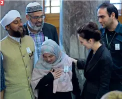  ??  ?? 2 New Zealand Prime Minister Jacinda Ardern meets Muslim community leaders after the parliament session in Wellington