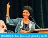  ?? — AFP ?? MINNEAPOLI­S: Ilhan Omar, newly elected to the US House of Representa­tives on the Democratic ticket, speaks to a group of supporters on Tuesday.