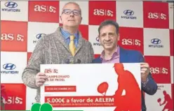  ??  ?? DONACIÓN. Flores Pérez, de AELEM, recibió el cheque de manos de Jaime Álvaro, de As.