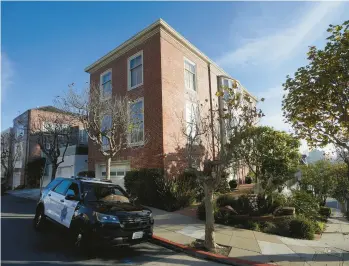  ?? JEFF CHIU/AP ?? A police vehicle is parked outside the home of House Speaker Nancy and Paul Pelosi on Saturday in San Francisco.