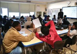  ?? PHOTOS BY PABLO UNZUETA FOR CALMATTERS ?? High school math students prepare for finals week at Emery High School in Emery on Dec. 13, 2023. Emery Unified is a small district tucked between Berkeley and Oakland