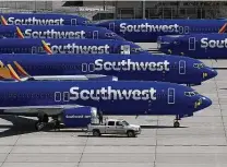  ?? Mark Ralston / Getty Images ?? Southwest, which is the nation’s largest 737 Max customer, will be pulling about 300 flights a day from a peak-day schedule.