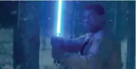  ?? INSTAGRAM STAR WARS ?? BLUE LIGHTSABER: John Boyega sebagai Finn dalam teaser Star Wars: The Force Awakens.