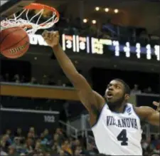  ?? KEITH SRAKOCIC — THE ASSOCIATED PRESS ?? Villanova’s Eric Paschall dunks against Alabama during the second half of the Wildcats’ blowout victory in the NCAA’s second round last Saturday in Pittsburgh.