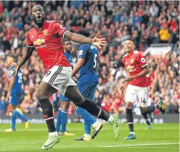  ??  ?? Romelu Lukaku scores against former club Everton to make it 3-0 for Manchester United.