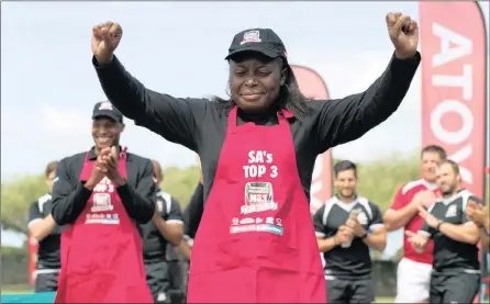  ??  ?? VICTORY DANCE: Queen Mathebula reacts after being announced the winner in the 2017 Final of the Shoprite Checkers Championsh­ip Boerewors Competitio­n held at the Langa Sports Complex in Cape Town.